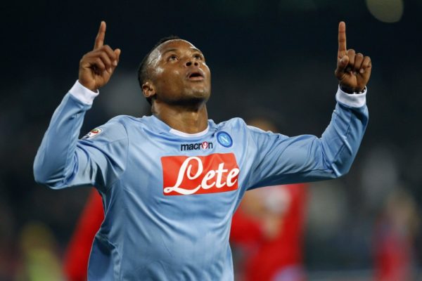 Napoli's Zuniga celebrates after scoring against Catania during their Italian Serie A soccer match in Naples